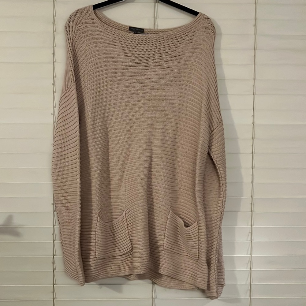 Long sweater with front pockets